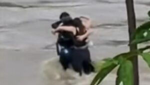 Watch: Three Friends Hug Each Other Before Being Swept Away By Italian Floodwaters