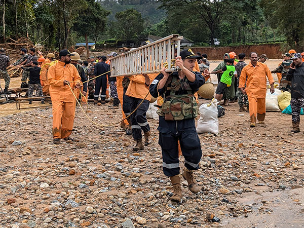 The search and rescue operations are underway after a devastating landslide hit hilly villages triggered by heavy rainfall, claiming the lives of 143 people, at Chooralmala in Wayanad on Wednesday. (ANI Photo)