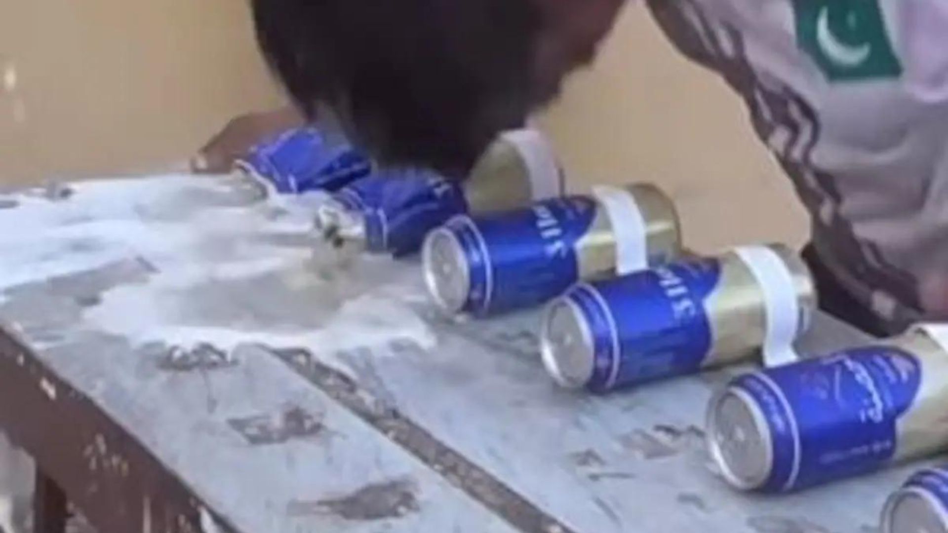 Pakistani Man Sets World Record By Crushing 39 Cans With His Head In 30 Seconds