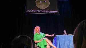 Watch: Liz Truss Walks Off Stage After ‘I Crashed The Economy’ Banner Trolling