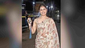 Olympic Medalist Manu Bhaker Dazzles in Ivory Saree on KBC 16 | Watch