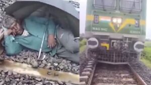 Watch: UP Man Sleeps On Railway Track Under Umbrella As Train Approaches