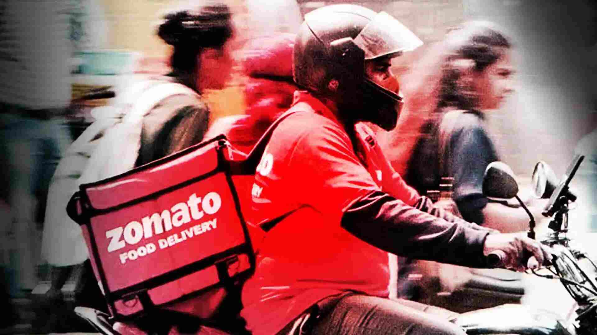 Drenched Zomato Delivery Agent, Tries To Spot Customers In Traffic