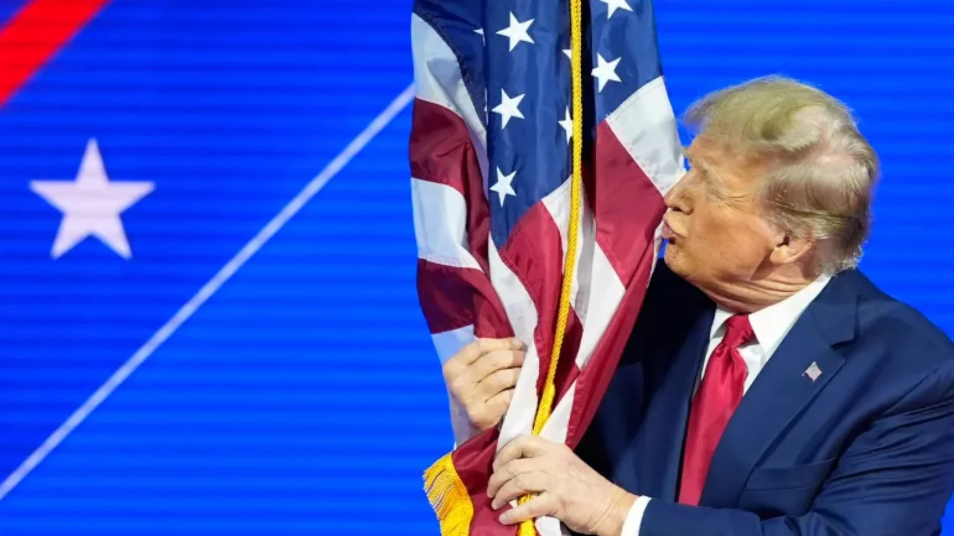 Watch Trump’s Flag Signing Sparks Debate: Code Violation Or Political Stunt?