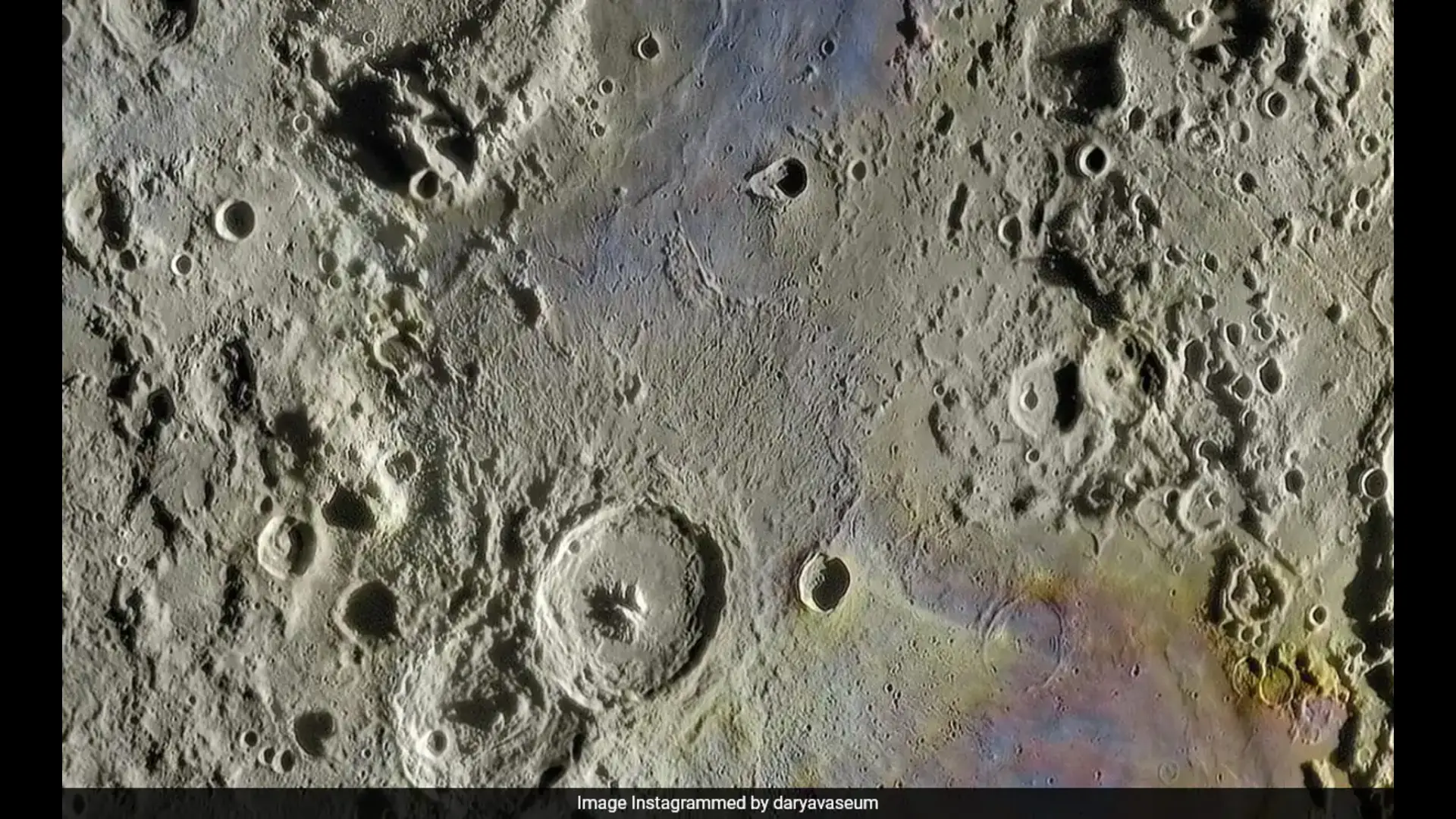 Mirza's groundbreaking lunar photograph, featuring enhanced colors to reveal hidden details of the Moon's surface.