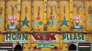 Decoding ‘Horn Ok Please’: The Meaning And Significance Behind This Popular Truck Phrase