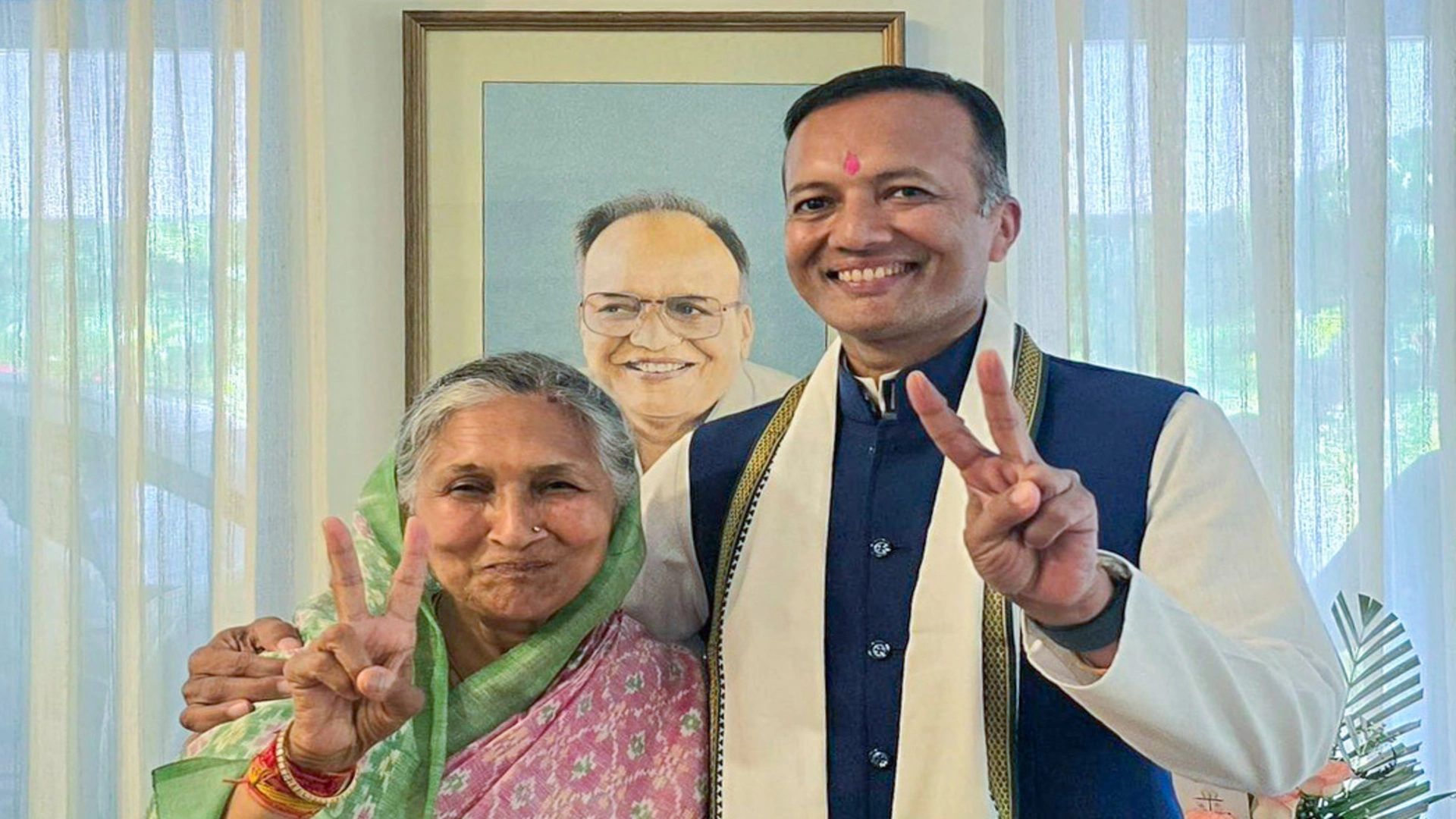 Naveen Jindal and Savitri Jindal celebrate her victory in the Haryana Assembly elections