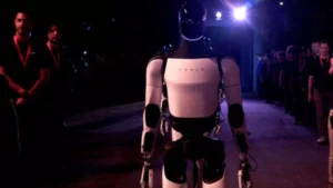 Watch: Tesla Humanoid Robot Optimus Interaction With Humans, Wanting To Be More Human