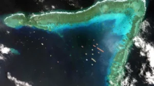 Satellite Images Reveal Chinese Vessels Cluster Near Disputed Philippine Island Amid Tensions