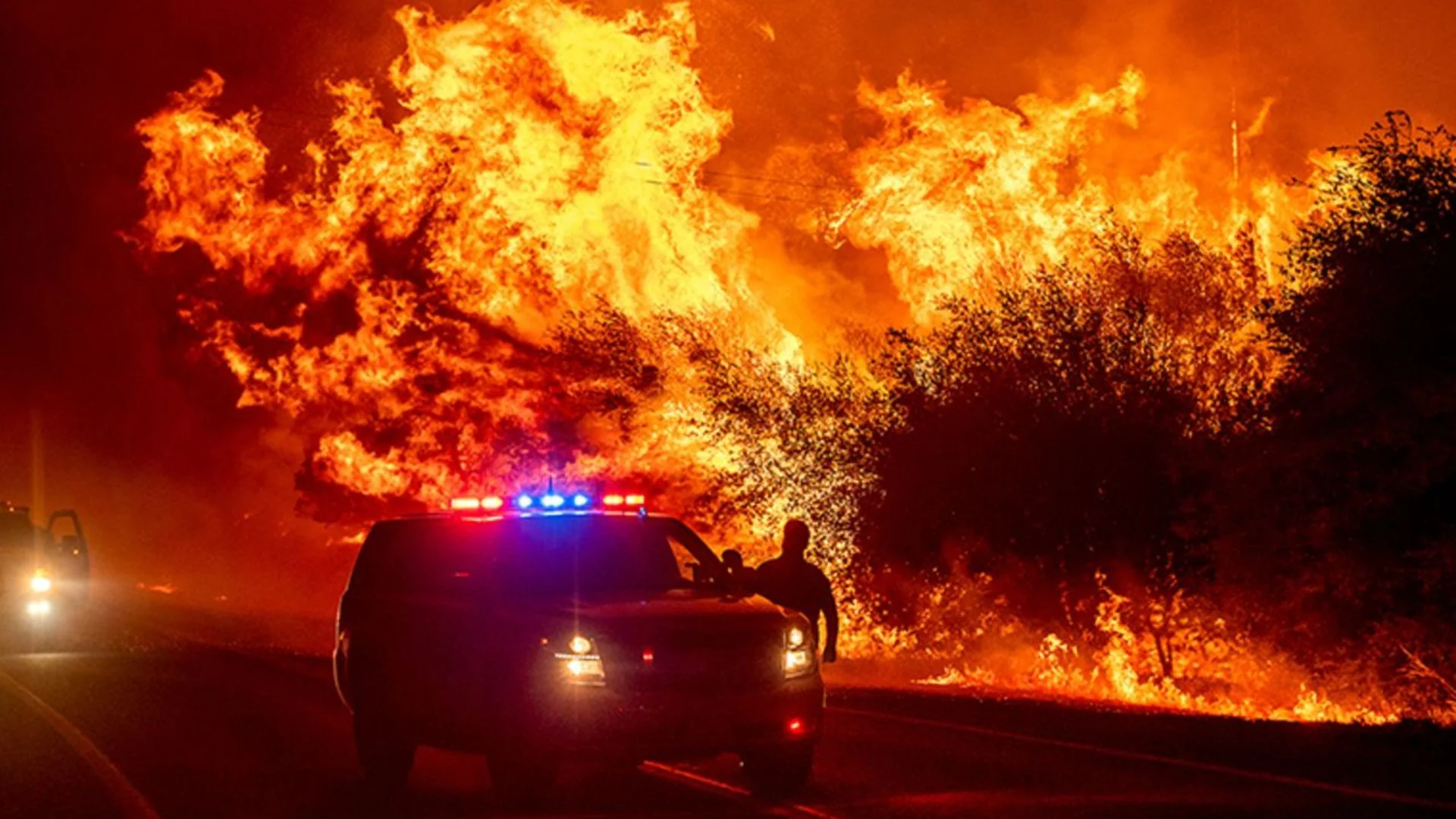 Firefighters Tackle Wildfires On Both East And West Coasts As Fatalities Mount In US