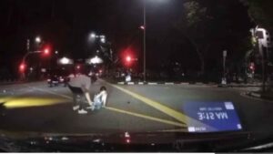 Woman Crosses Road While on Phone, Knocked Down; Netizens Call Her ‘Phone Zombie’