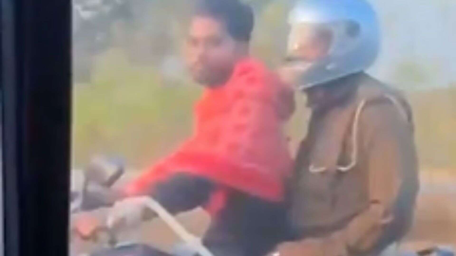 Handcuffed Criminal Rides Bike, Cop On The Backseat | WATCH