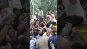 DU Law Students Protest for 10-Day Exam Extension; Dean Blocked and Escorted by Police