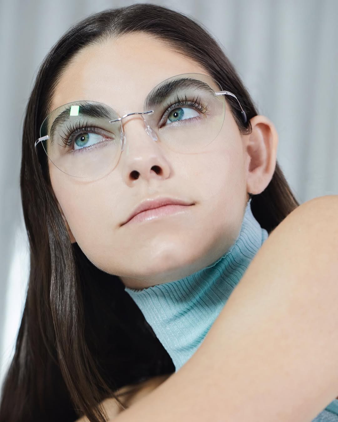 Carson donning “Blueberry” gear amidst space camp memorabilia. - Photo Gallery