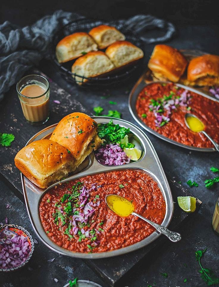 Pav bhaji sizzling with butter is monsoon street magic. - Photo Gallery