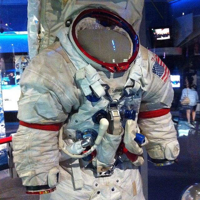 Early Apollo astronaut space suit design showcasing bulky protection. - Photo Gallery