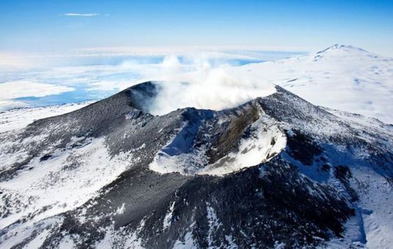 Mount Erebus with smoke and snow in Antarctica. - Photo Gallery