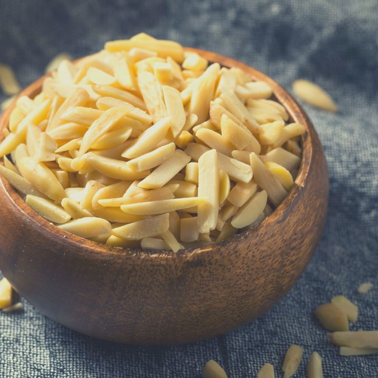 Mixing slivered almonds into the chocolate mixture. - Photo Gallery