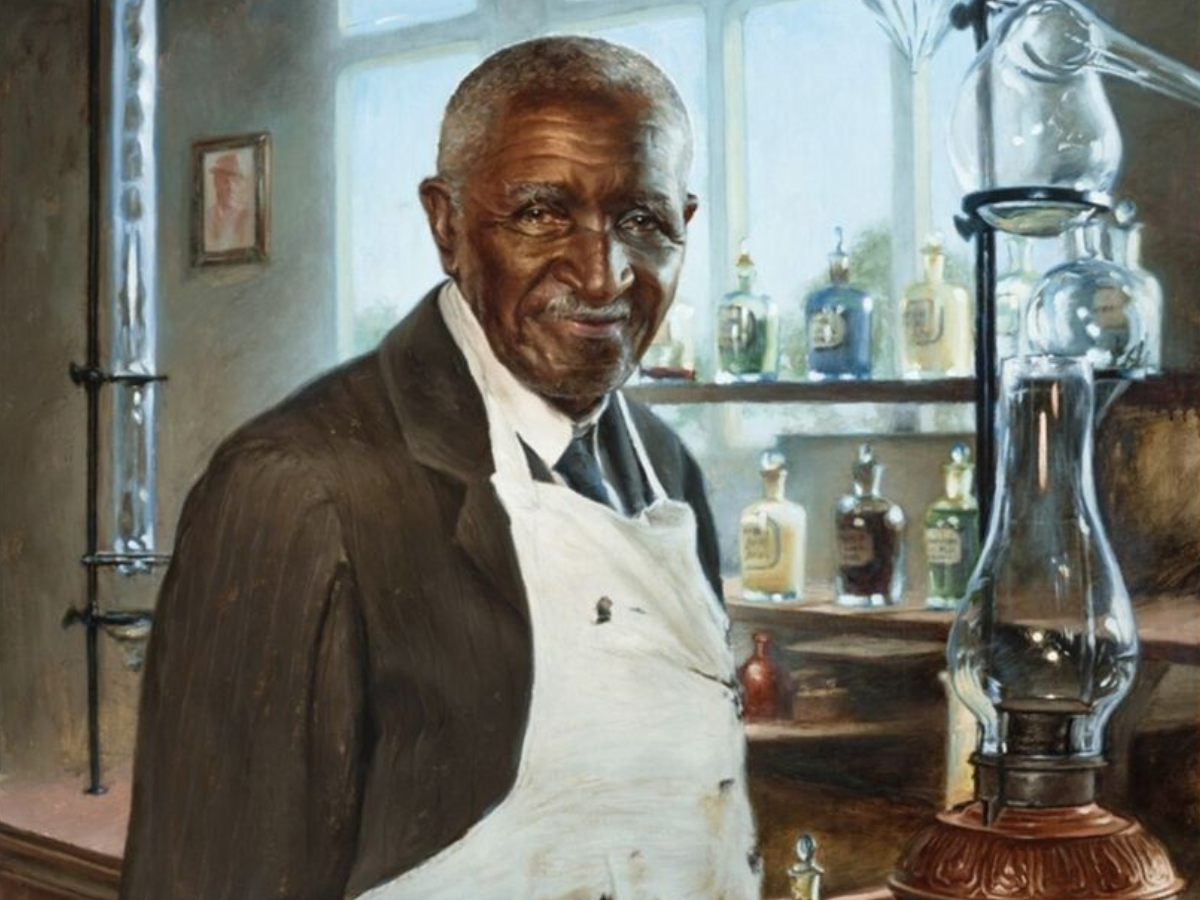 George Washington Carver researching plants in his agricultural laboratory. - Photo Gallery