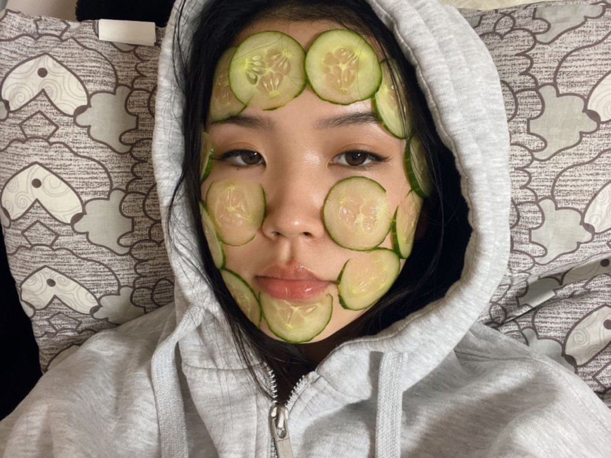 Sliced cucumber on face for skincare - Photo Gallery