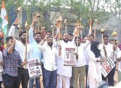 Bengaluru: Youth Congress holds torchlight rally demanding Dharmendra Pradhan's resignation