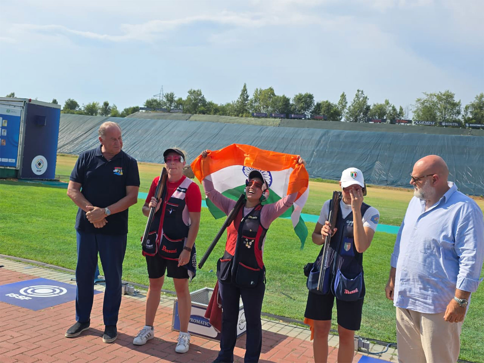 Neeru Dhanda with Indian flag after winning gold medal in trap event at ISSF World Cup 2026 in Italy. (Photo: ISSF)