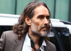 Comedian Russell Brand denies rape charges as he takes stand during trial